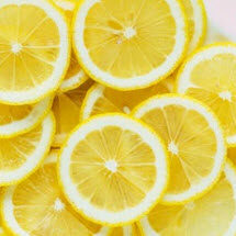 Photo Of Sliced Lemons On White Plate 953219